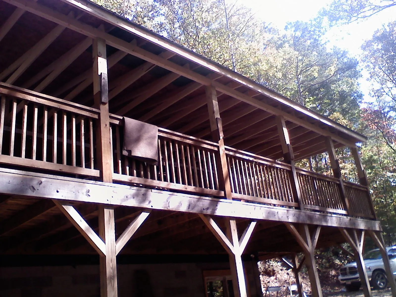 Timber framing under a new elevated porch and deck — Roof Leak Repair in Nickerson by Roofing Brothers